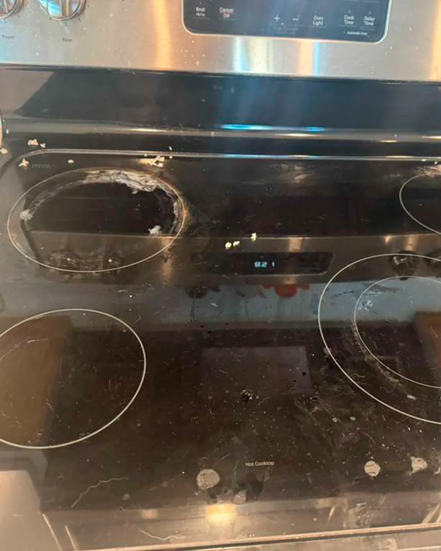 Greasy stovetop before deep cleaning