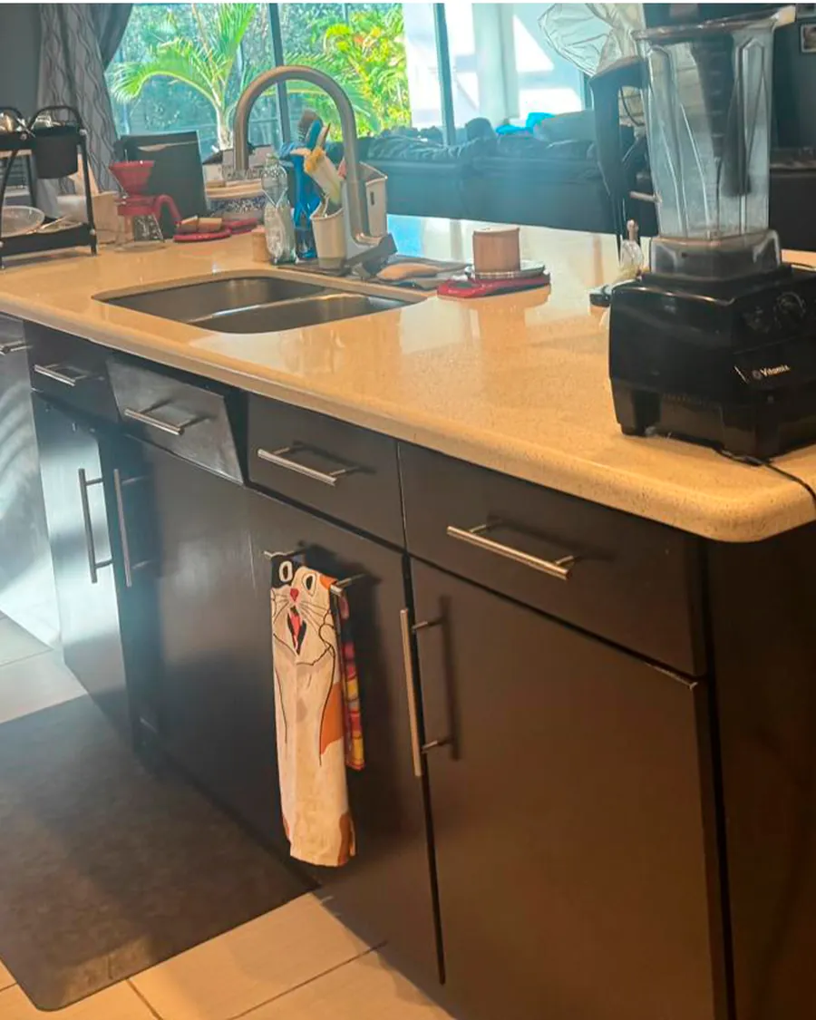 Same kitchen counter clear and clean after